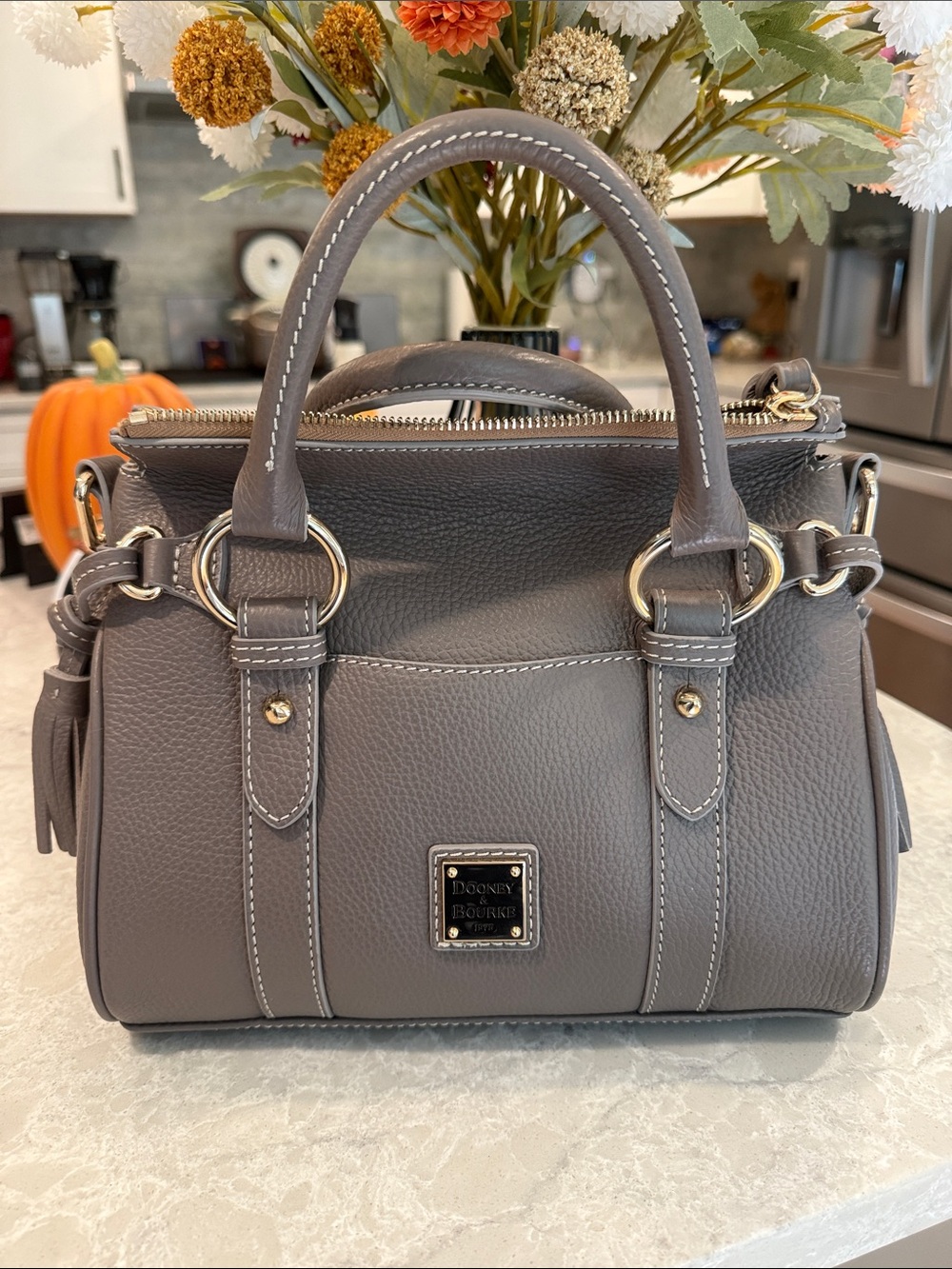 Dooney and Bourke Lucca leather 30 with pocket
